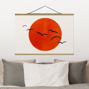 Stoffbild mit Posterleisten - Vogelschwarm vor roter Sonne I - Querformat 3:2