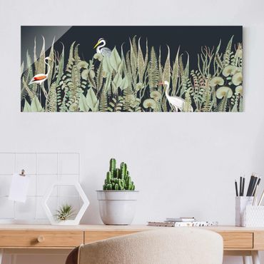 Glasbild - Flamingo und Storch mit Pflanzen auf Grün - Panorama