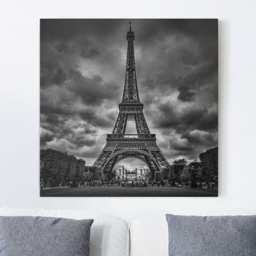 Leinwandbild - Eiffelturm vor Wolken schwarz-weiß - Quadrat 1:1