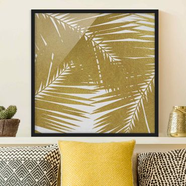 Bild mit Rahmen - Blick durch goldene Palmenblätter - Quadrat