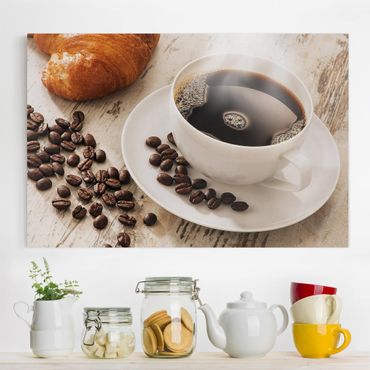 Leinwandbild - Dampfende Kaffeetasse mit Kaffeebohnen - Quer 3:2