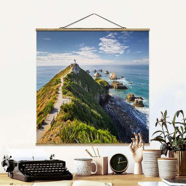 Stoffbild mit Posterleisten - Nugget Point Leuchtturm und Meer Neuseeland - Quadrat 1:1