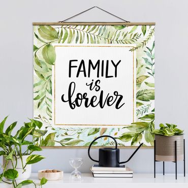 Stoffbild mit Posterleisten - Family is forever in goldenem Rahmen mit Palmenwedeln - Quadrat 1:1