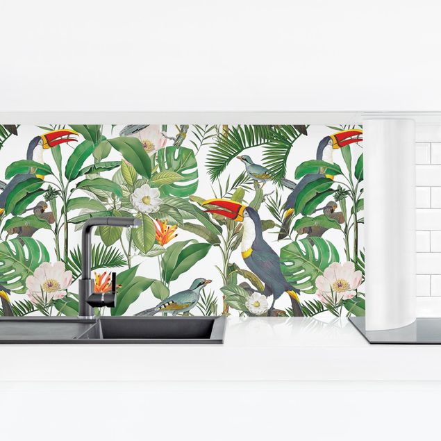 Küchenrückwände Blumen Tropischer Tukan mit Monstera und Palmenblättern