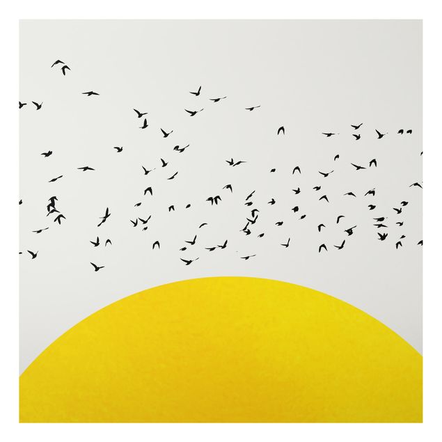 Wandbilder Landschaften Vogelschwarm vor gelber Sonne
