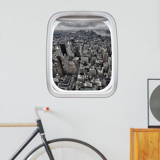 Autocolantes de parede metrópoles Fenster Flugzeug Blick über Manhattan