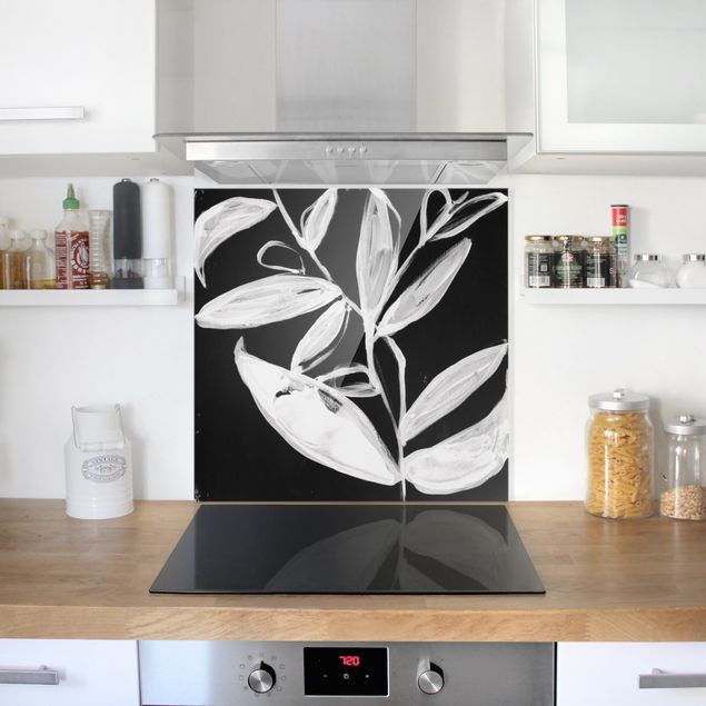 Glasrückwand Küche Blumen Gemalte Blätter auf Schwarz