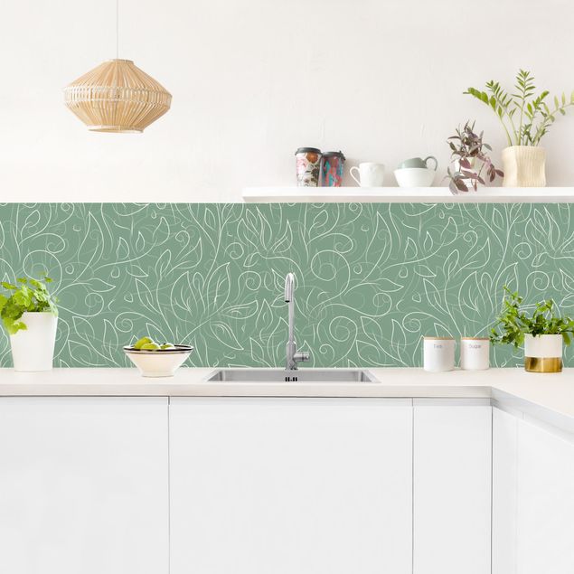 Glasrückwand Küche Wildes Pflanzen Muster auf Grün