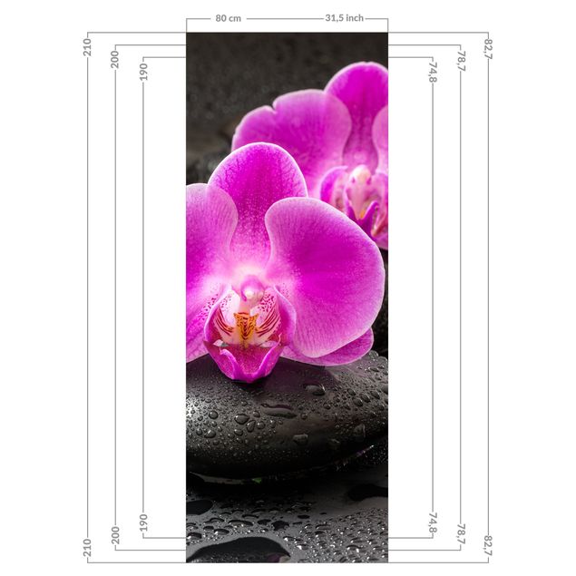 Duschrückwand - Pinke Orchideenblüten auf Steinen mit Tropfen