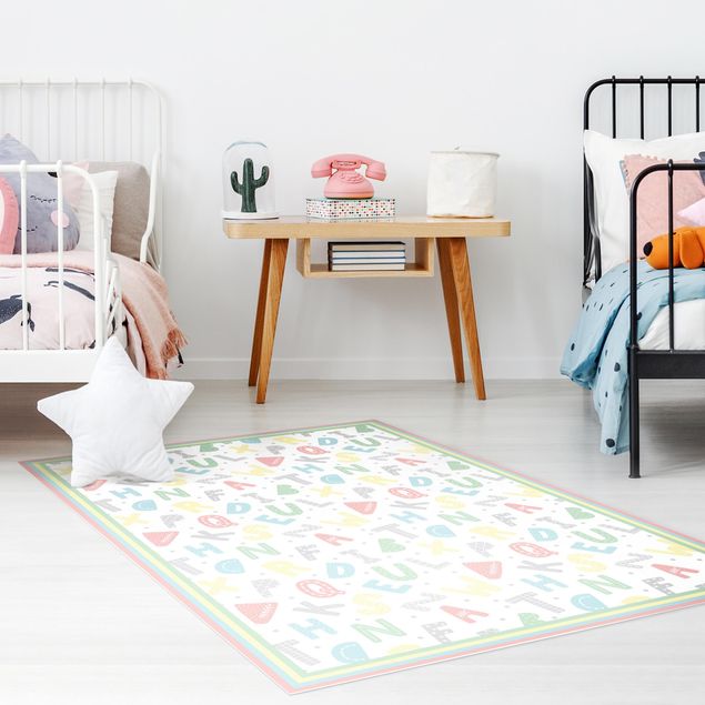 Babyzimmer Deko Alphabet in Pastellfarben mit Rahmen