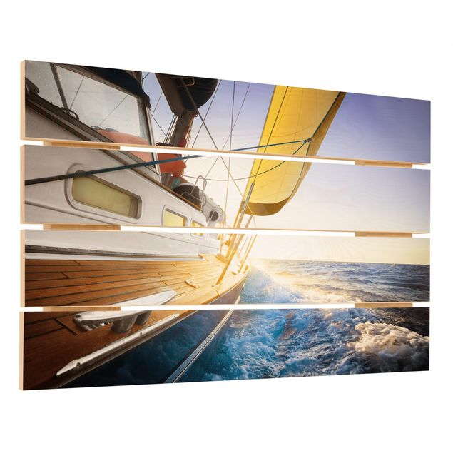 Holzbilder Segelboot auf blauem Meer bei Sonnenschein