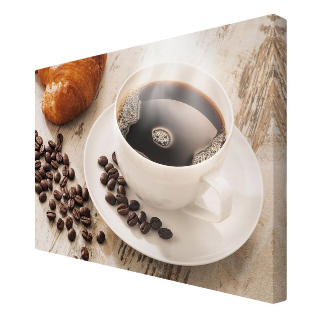 Leinwandbilder kaufen Dampfende Kaffeetasse mit Kaffeebohnen