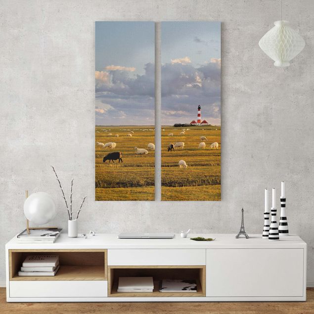 Wandbilder Berge Nordsee Leuchtturm mit Schafsherde