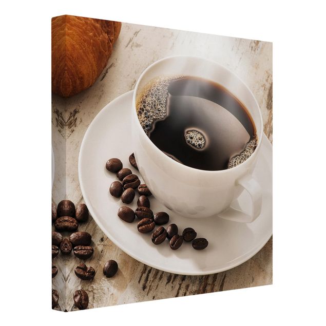 Leinwandbilder Kaffee Dampfende Kaffeetasse mit Kaffeebohnen