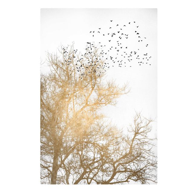 Kunstdrucke auf Leinwand Vogelschwarm vor goldenem Baum