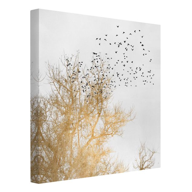 Wandbilder Landschaften Vogelschwarm vor goldenem Baum