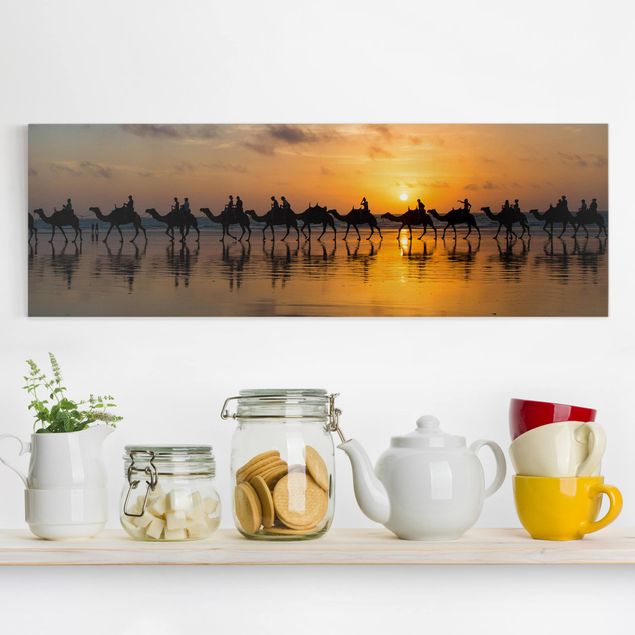 Wanddeko Küche Kamele im Sonnenuntergang