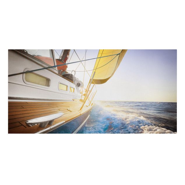 Leinwand Natur Segelboot auf blauem Meer bei Sonnenschein