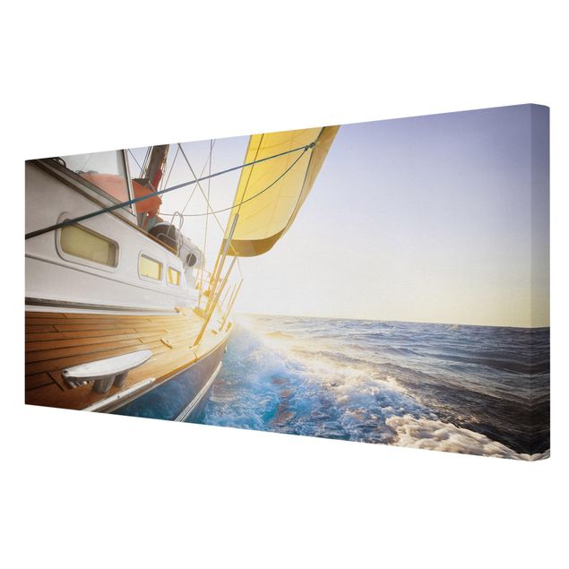 Leinwandbilder Strand Segelboot auf blauem Meer bei Sonnenschein