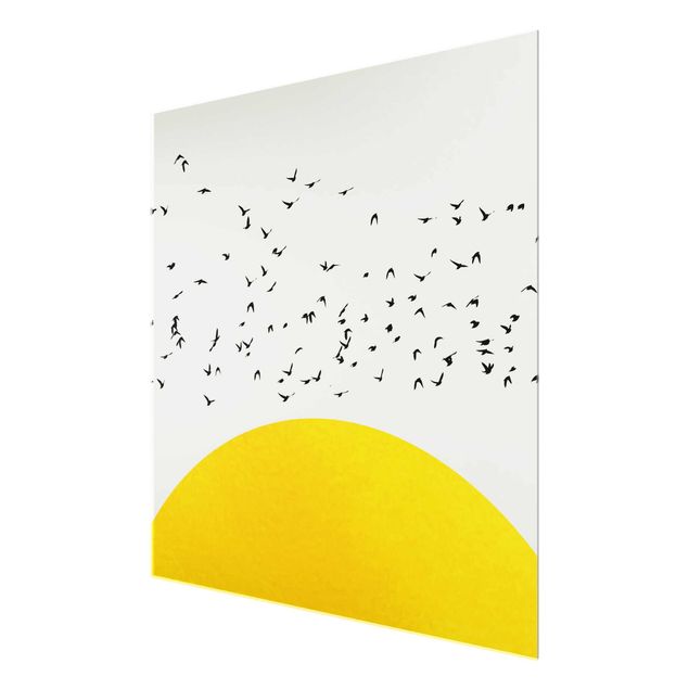 Wandbilder Kunstdrucke Vogelschwarm vor gelber Sonne