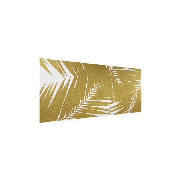 Wandbilder Floral Blick durch goldene Palmenblätter