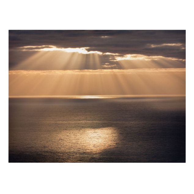 Kunstdrucke auf Leinwand Sonnenstrahlen über dem Meer