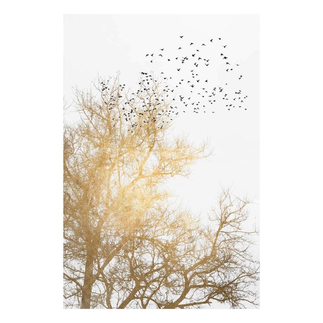 Glasbilder Tiere Vogelschwarm vor goldenem Baum