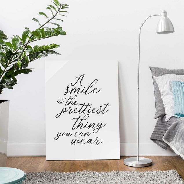 Glasbild mit Spruch A smile is the prettiest thing
