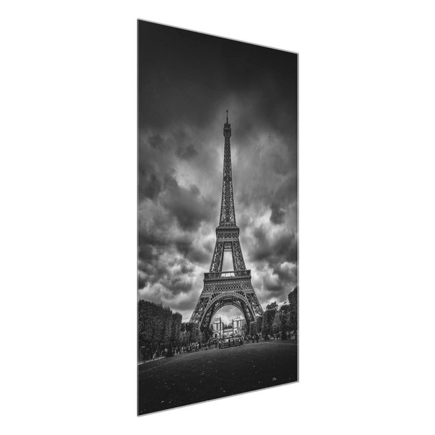 Glasbilder Schwarz-Weiß Eiffelturm vor Wolken schwarz-weiß