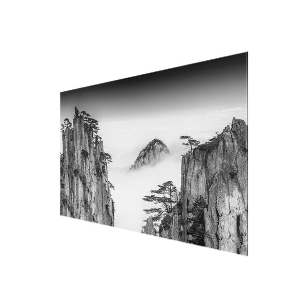 Glasbilder Blumen Motive Felsen im Nebel schwarz-weiß