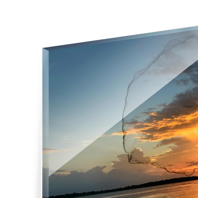 Glasbilder Landschaften Netz im Sonnenuntergang