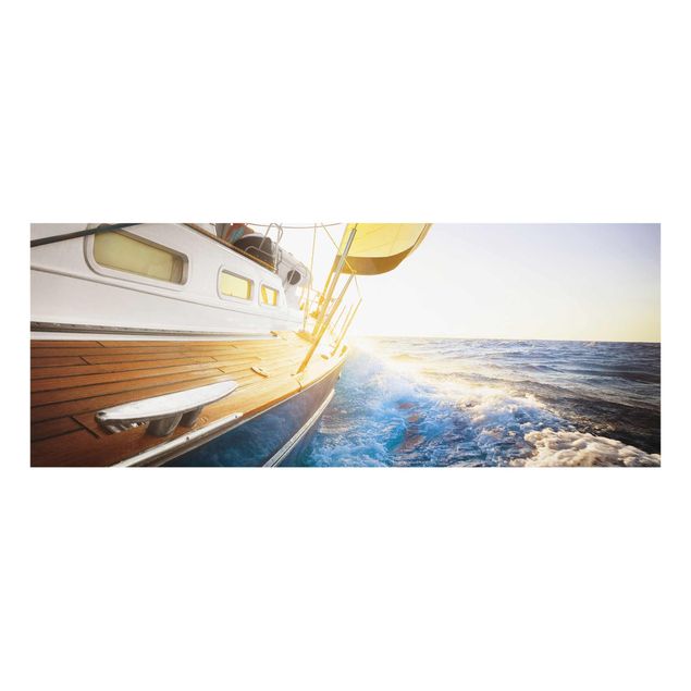 Glasbild Meer Segelboot auf blauem Meer bei Sonnenschein