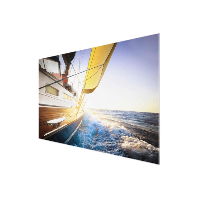 Glasbilder Natur Segelboot auf blauem Meer bei Sonnenschein