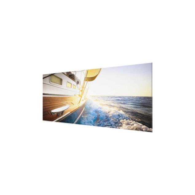 Wandbilder Glas Natur Segelboot auf blauem Meer bei Sonnenschein