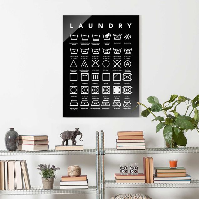 Glasbild mit Spruch Laundry Symbole Schwarz-Weiß