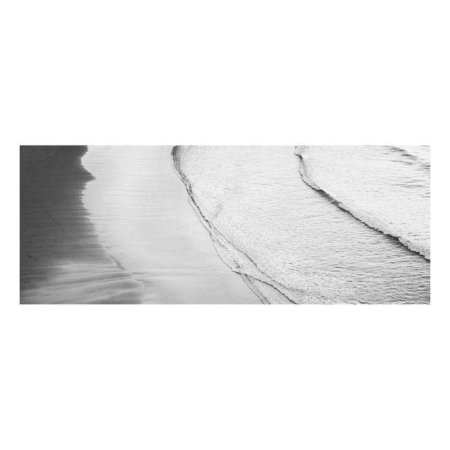 Glasbilder Strand und Meer Leichter Wellengang am Strand Schwarz Weiß