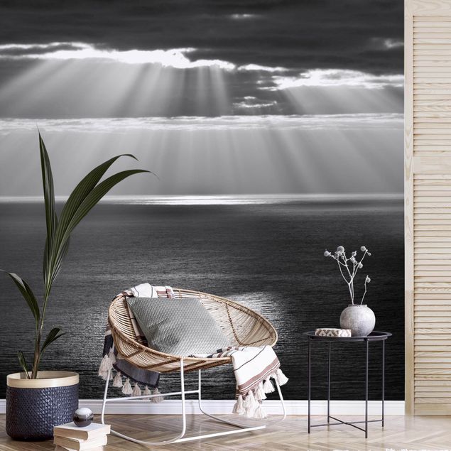 Wanddeko Küche Sonnenstrahlen über dem Meer Schwarz-Weiß