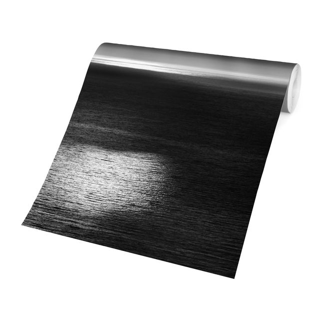 Fototapete Schwarz-Weiß Sonnenstrahlen über dem Meer Schwarz-Weiß