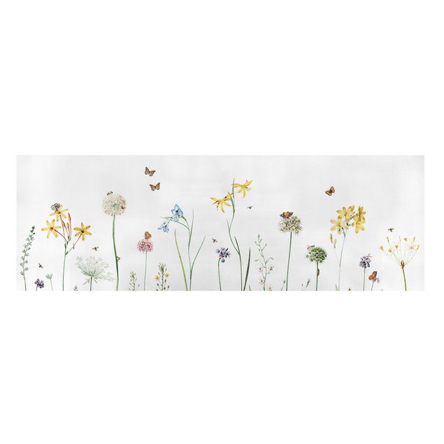 Blumenbilder auf Leinwand Tanzende Schmetterlinge auf Wildblumen