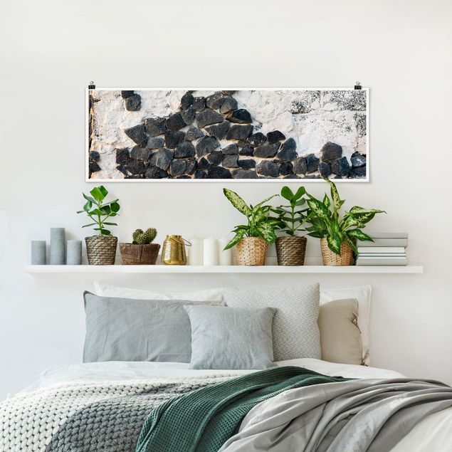 Poster Kunstdruck Mauer mit Schwarzen Steinen
