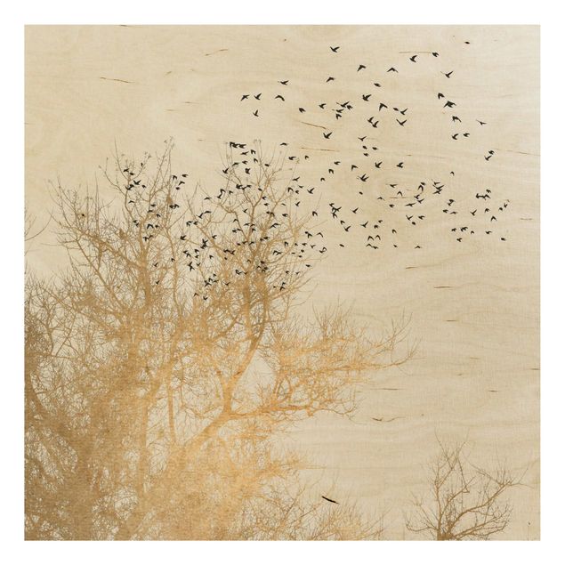 Holzbilder Landschaften Vogelschwarm vor goldenem Baum
