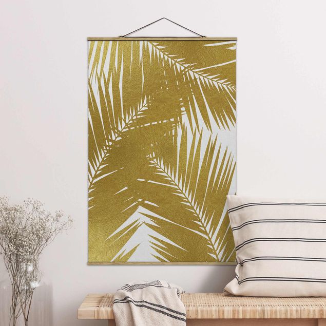 Wanddeko Küche Blick durch goldene Palmenblätter
