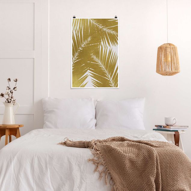 Wandbilder Landschaften Blick durch goldene Palmenblätter