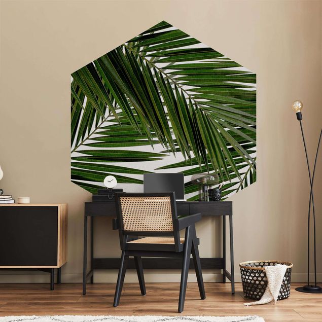 Tapeten Modern Blick durch grüne Palmenblätter