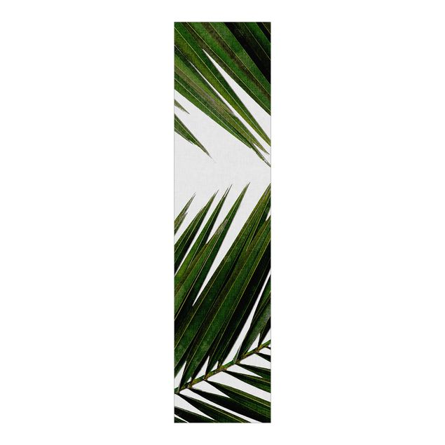 Schiebevorhang Blumen Blick durch grüne Palmenblätter
