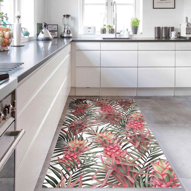 Wanddeko Küche Rote Ananas mit Palmenblättern Tropisch