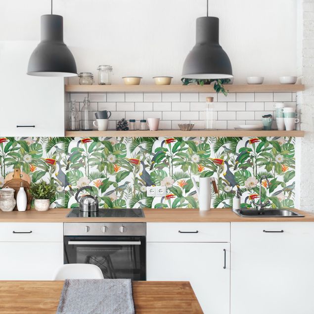 Küchenrückwände Blumen Tropischer Tukan mit Monstera und Palmenblättern II