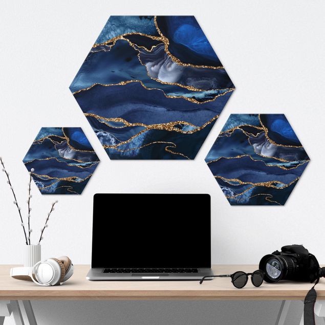 Hexagon Bilder Goldene Glitzer Wellen vor Blau