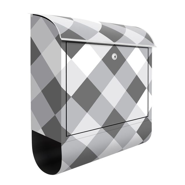 grauer Briefkasten Geometrisches Muster gedrehtes Schachbrett Grau