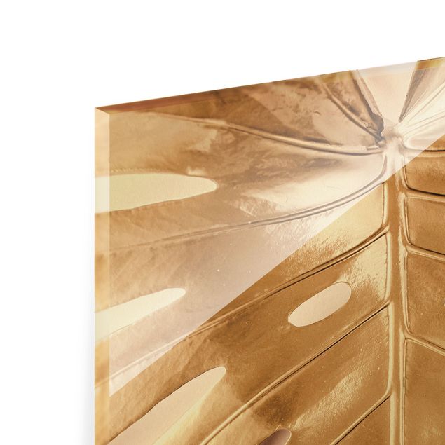 Glasbilder Goldenes Monsterablatt auf Rosa